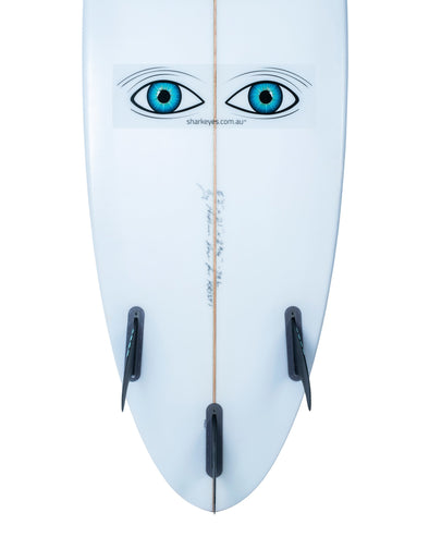 Shark-Eyes-visual-shark-deterrent-shark-repellent-clear-sticker-on-surfboard