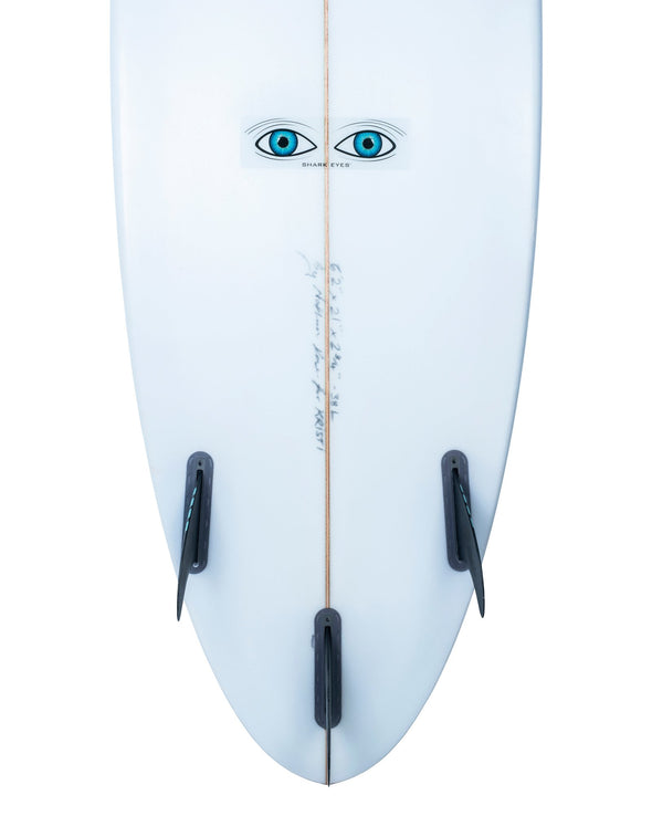 Shark-Eyes-visual-shark-deterrent-clear-shark-repellent-sticker-on-surfboard